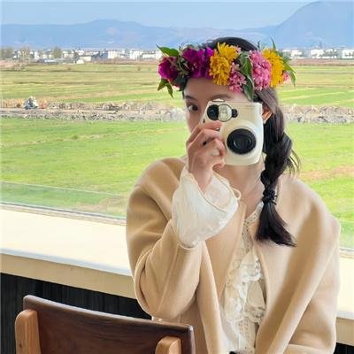 桃花含露又春风